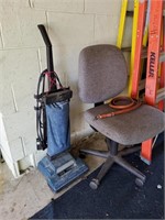 Office chair, vacuum, dog leash