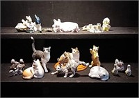 Miniature figurines of cats, squirrels, birds,