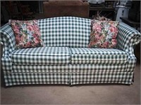 Adorable green and white plaid sleeper sofa with 2
