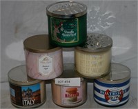 6 NEW SCENTED CANDLES