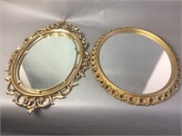 2  gold framed mirrors