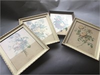 Assorted framed floral artwork