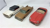 Three toy cars