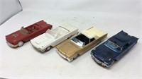 Four toy cars