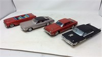 Four toy cars