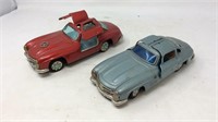 Two toy Mercedes