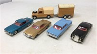 Five Corgi toy cars