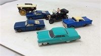 Six vintage toy cars