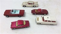Five vintage toy cars