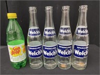 Lot of Welches Soda Bottles
