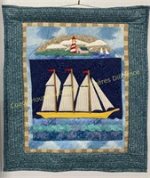 Hanging quilt, ship and lighthouse, courtepointe