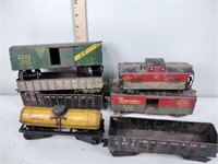 Toy train cars including New York central,
