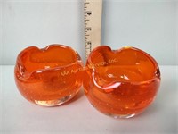 Orange art glass ashtrays