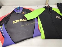Wet suits size 7-8, one has wear at sleeves