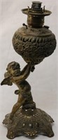 19TH C. BANQUET LAMP WITH CHERUB, ORIGINAL WORN