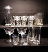 Set of six small etched glasses with a matching