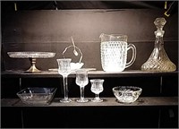 Cut glass items, including a cake plate with