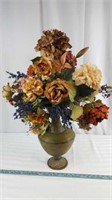 Colorful floral arrangement in a decorative vase.