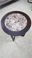 Round contemporary occasional table.