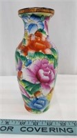 Asian style vase is beautiful and delicate.