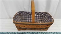 Longaberger basket with handle and liner.