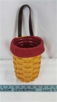 Cylinder Longaberger basket, burgundy fabric.