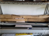 selection of shower/curtain rods, new in boxes