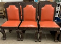 Rustic Carved Dining Chairs with Orange Vinyl