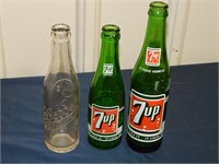 Embossed Dr. Pepper & vintage 7-UP bottles