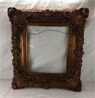 ANTIQUE ORNATE PICTURE FRAME MOUNTED ON WOOD