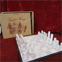 Carved stone chess set and gameboard.