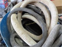 Assortment of hoses and a tub