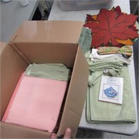 Box of placemats and table clothes.