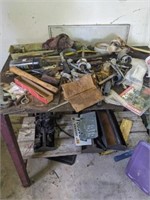 Table full of assorted tools