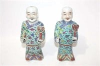Pair of chinese porcelain male dolls