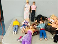 collection of dolls, international clothing