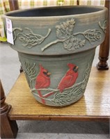 Plant pot with cardinals