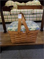 Wicker picnic basket with foral cloth lid