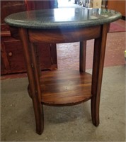 Oval accent table with Corian top