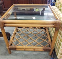 Glass topped wicker end table