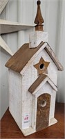 Wood and metal roof two entrance birdhouse