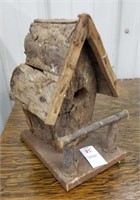 Rustic bark birdhouse