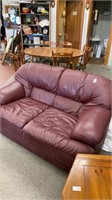 Red leather love seat