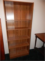 Tall faux wood book shelf