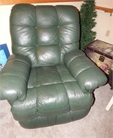 Overstuffed green leather rocker recliner