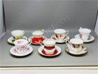 flat- misc cups/saucers- 7 sets
