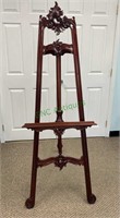 Fancy carved wood easel stand for holding a