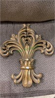 Heavy molded gold wall decoration. Measures 20