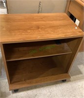 Small three level side table on wheels,