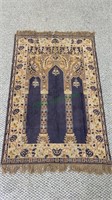Antique blue and gold silk prayer rug with an
